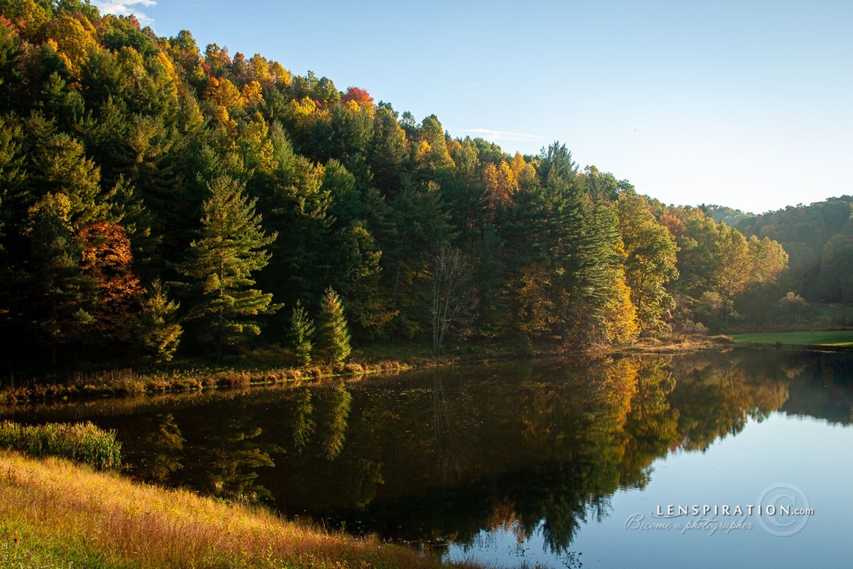 I went on an expedition with David up to Greenbrier Road seeking fall foliage. This lake on Buffalo Calf Road on the way was pretty nice. Looking for reflections.