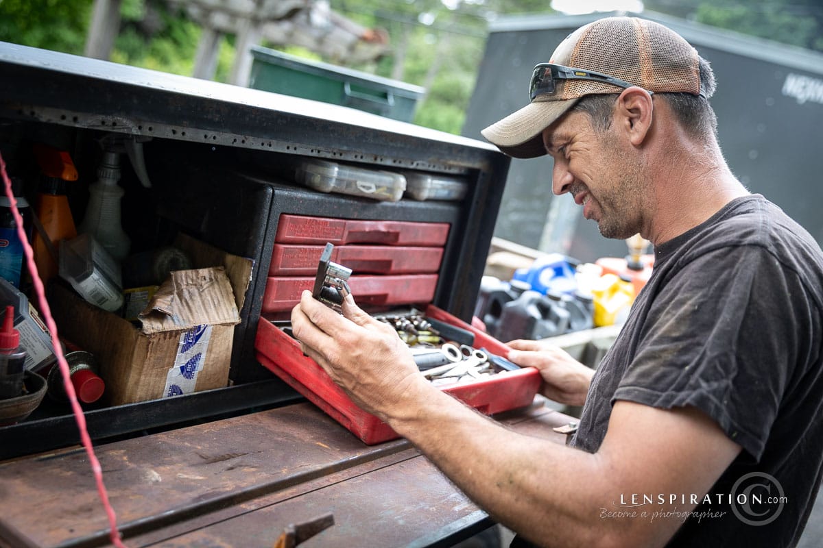 Photo assignment man working outdoors with tool box