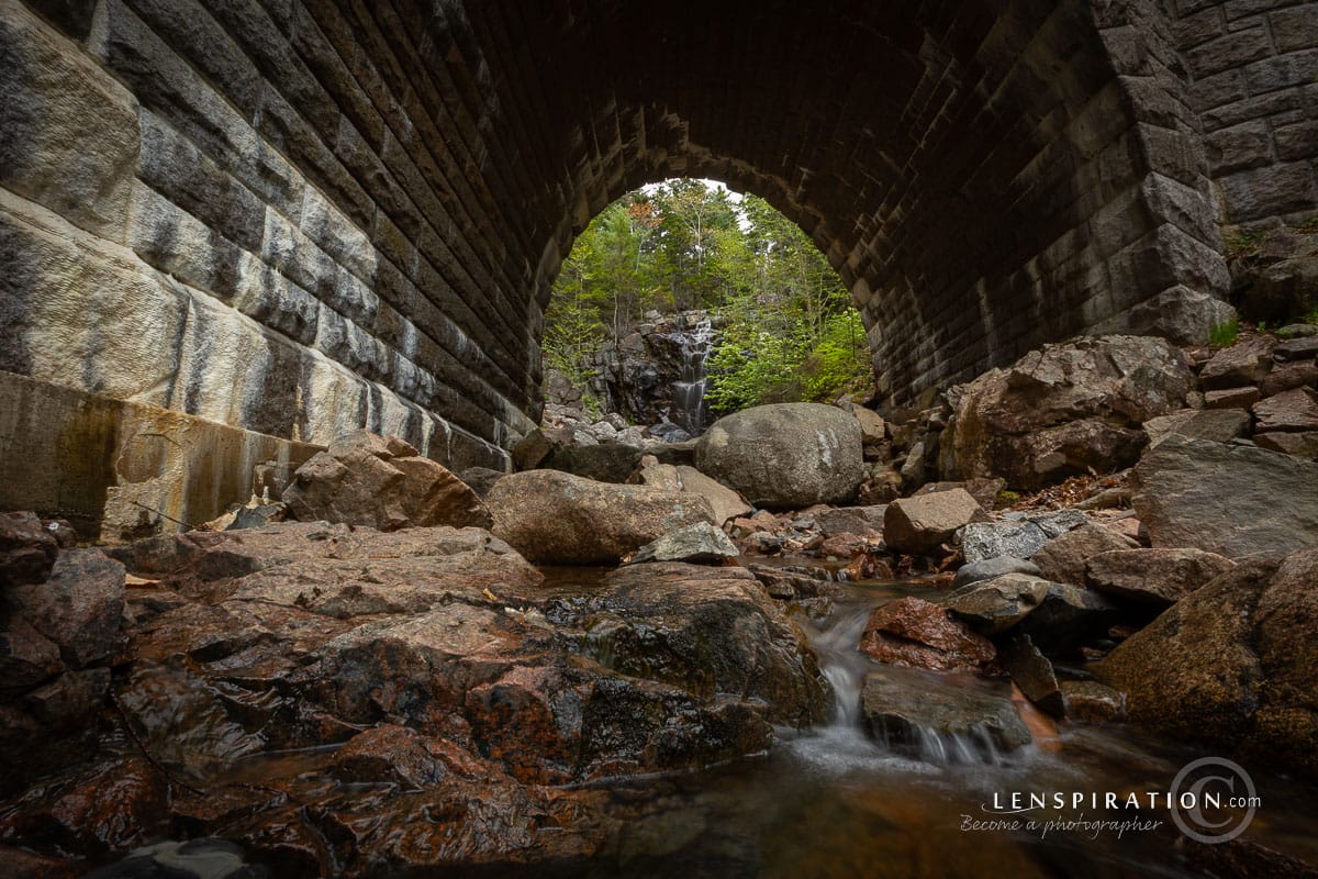 Waterfall under bridge at Acadia National Park in Maine, USA