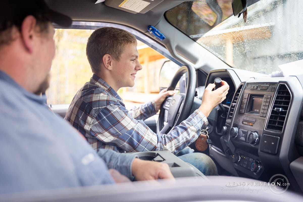 A father teaching his son how to drive