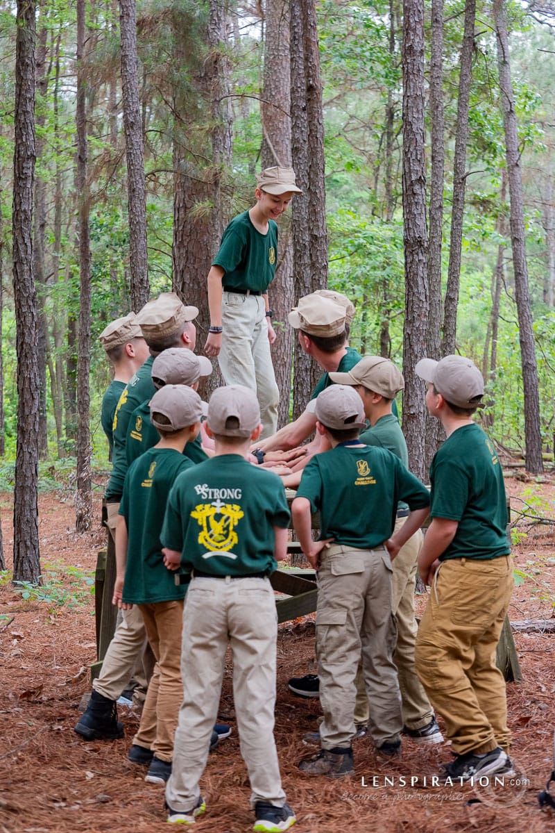 A next-level photo of boys playing a game of Trust