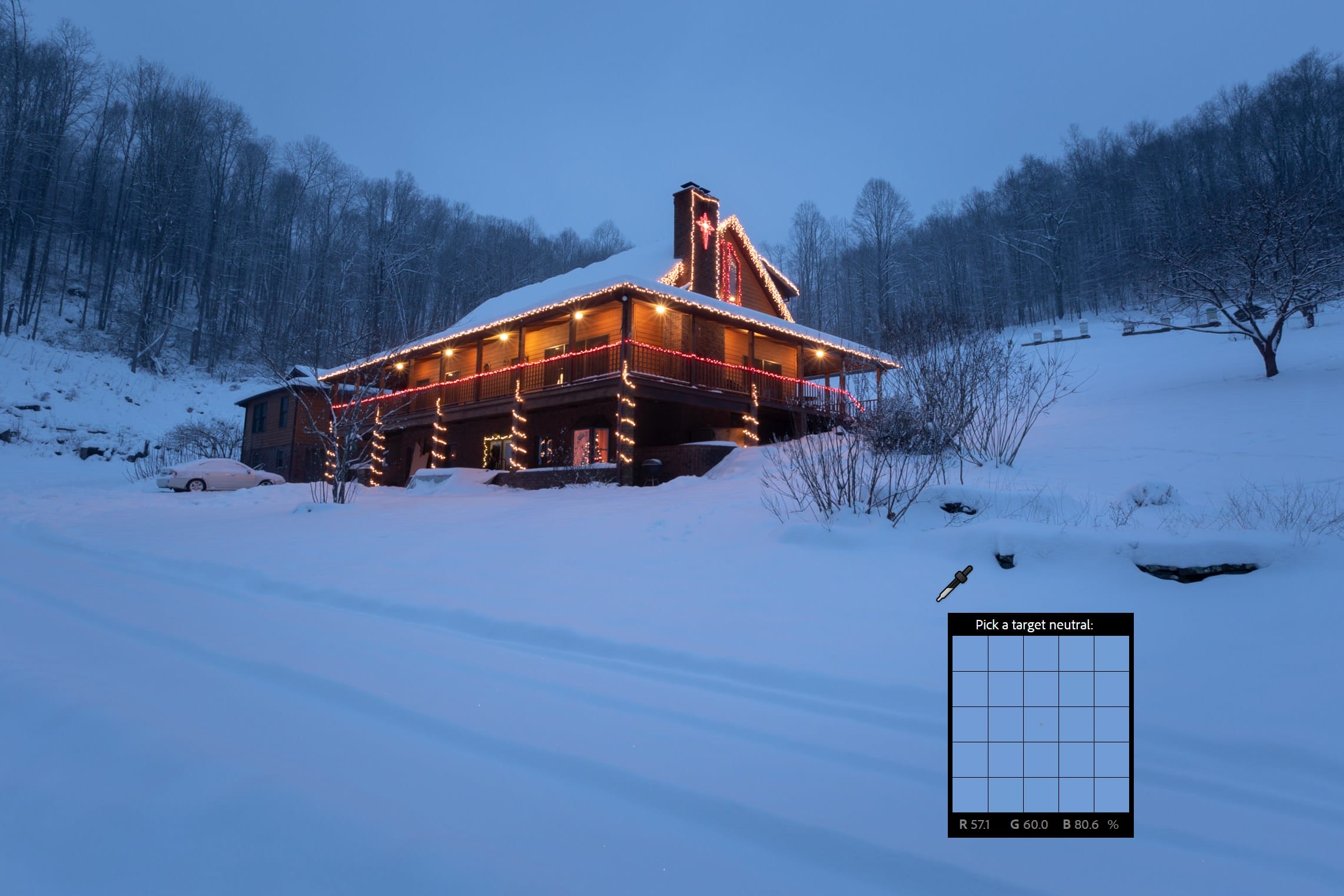 A cozy house surrounded by fresh snow in West Virginia, capturing peaceful winter tones and natural contrast — a serene study in seasonal color and atmosphere.