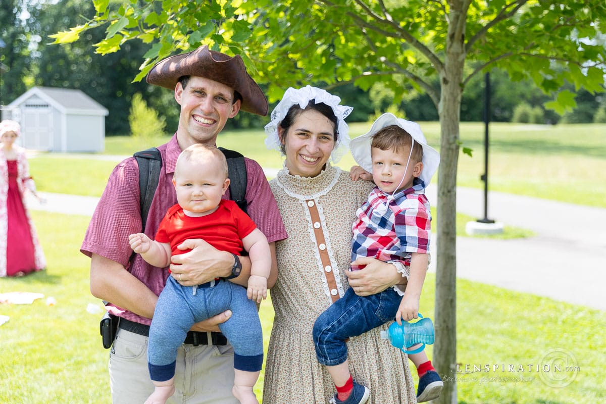 July 4th celebration with family dressed in colonial costumes