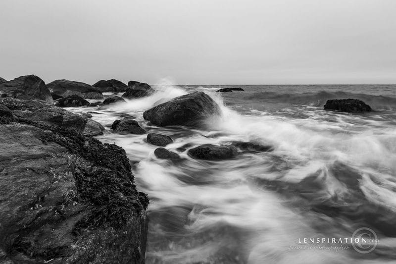 Swirling water on rocks at Hammonassett Beach State Park in Connecticut