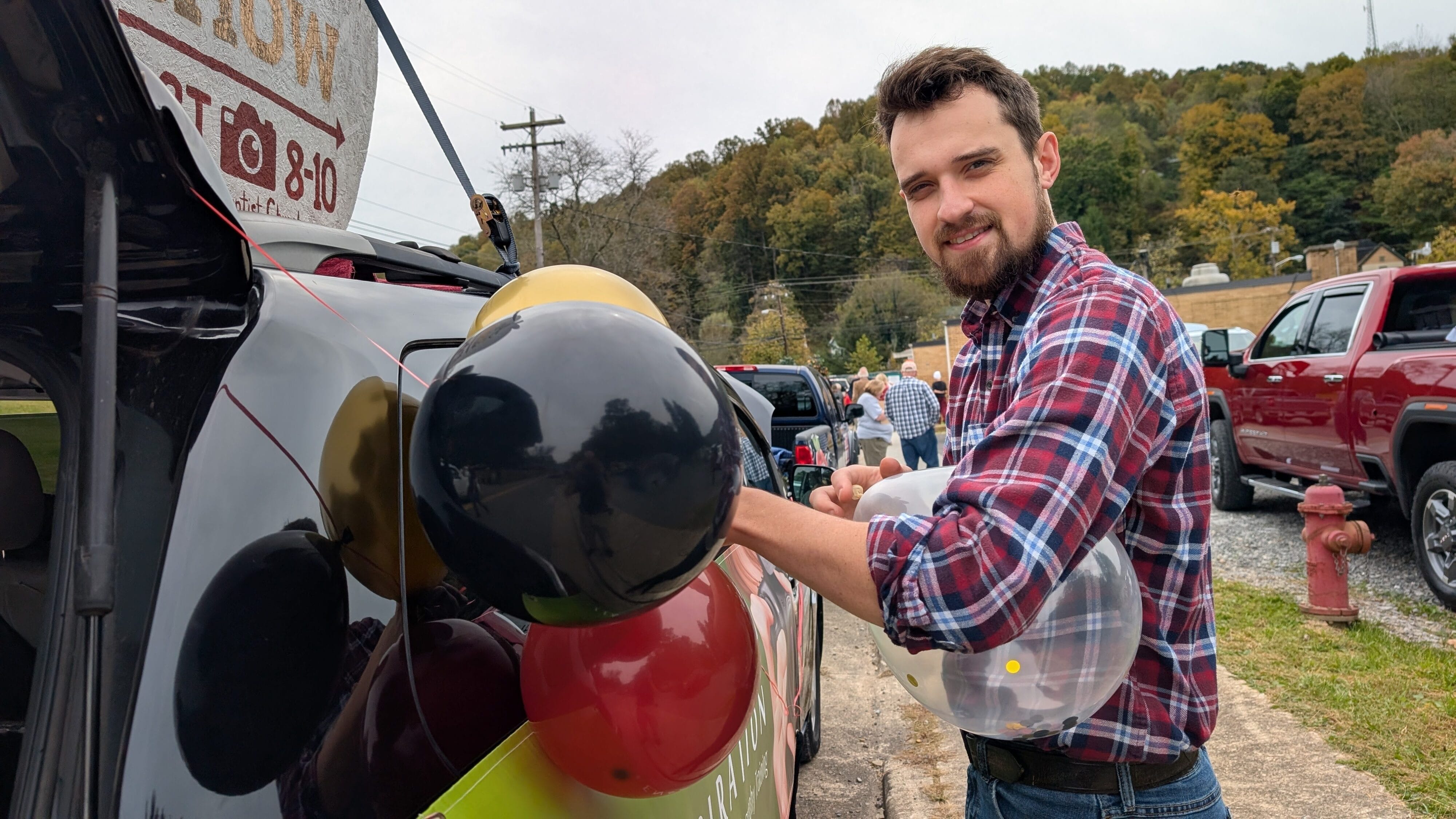 Lenspiration's Art Show float in the 2026 Apple Butter Festival parade in Salem, West Virginia